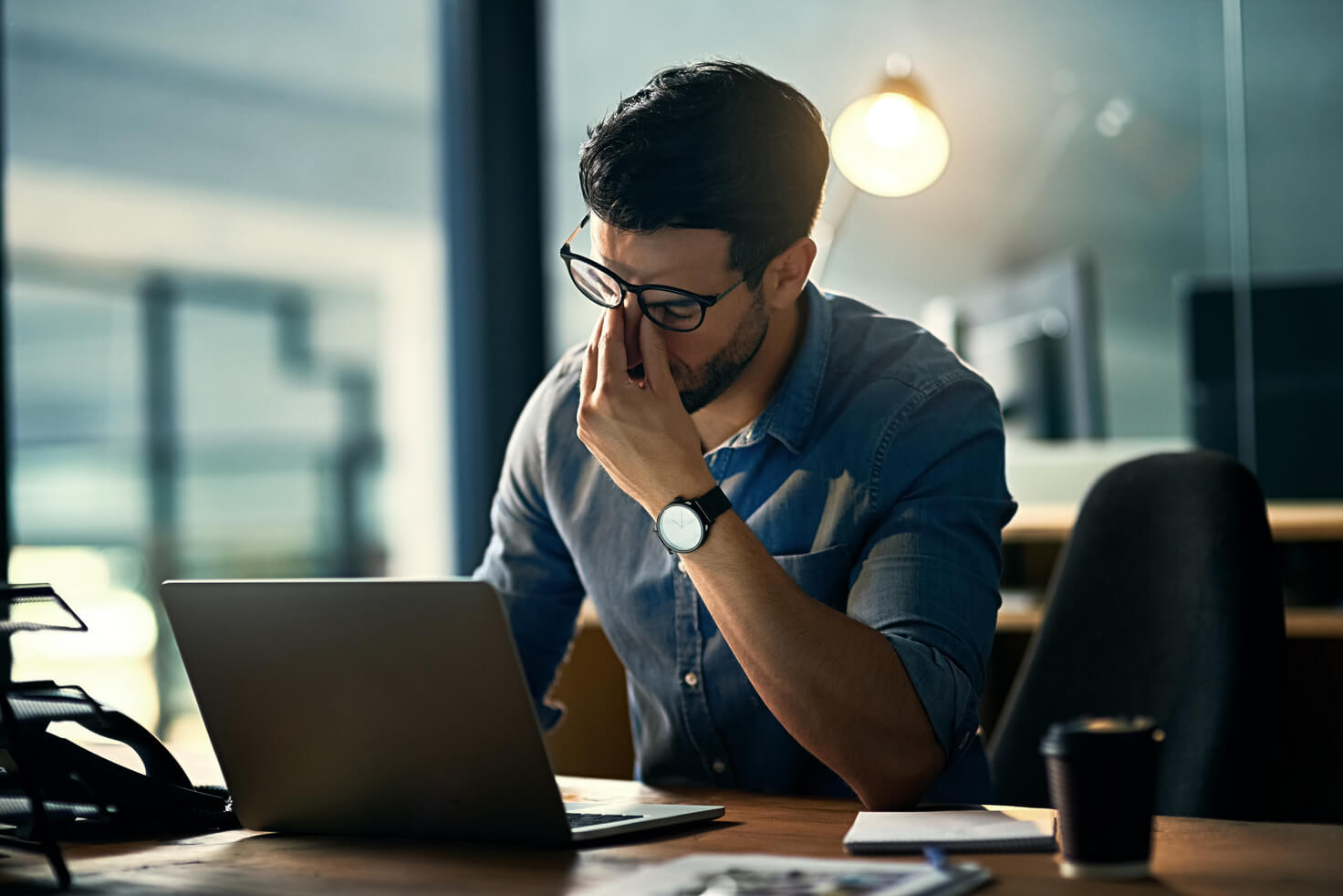 Man thinking in front of laptop-1